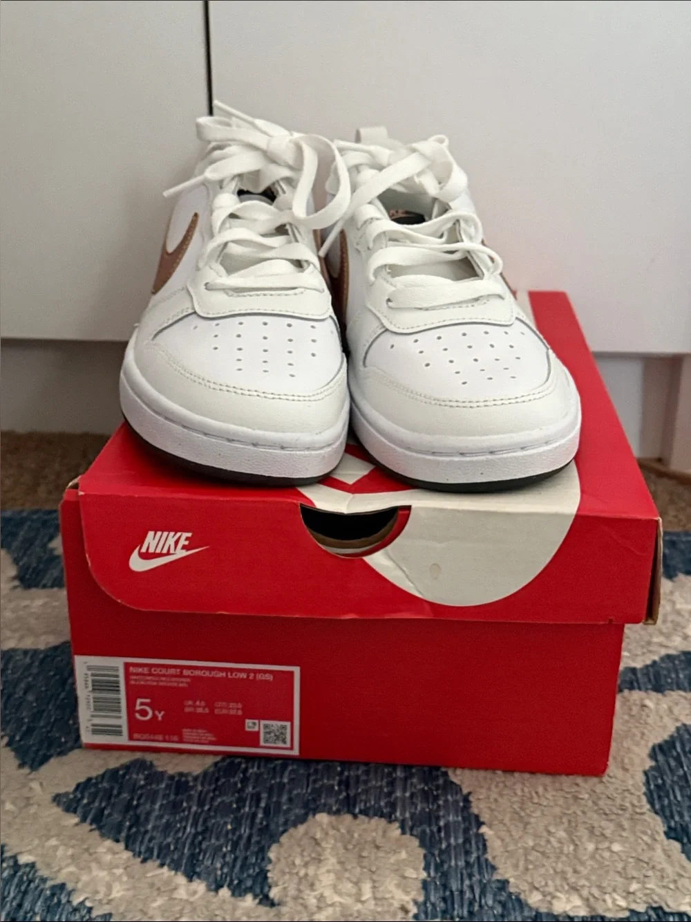 Nike Kids White Sneakers with Metallic Rose Swoosh